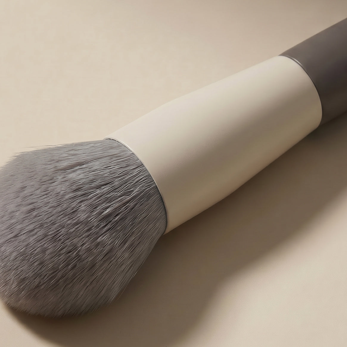 NOVAGLOW makeup brush closeup showing thickened ferrule and soft bristles